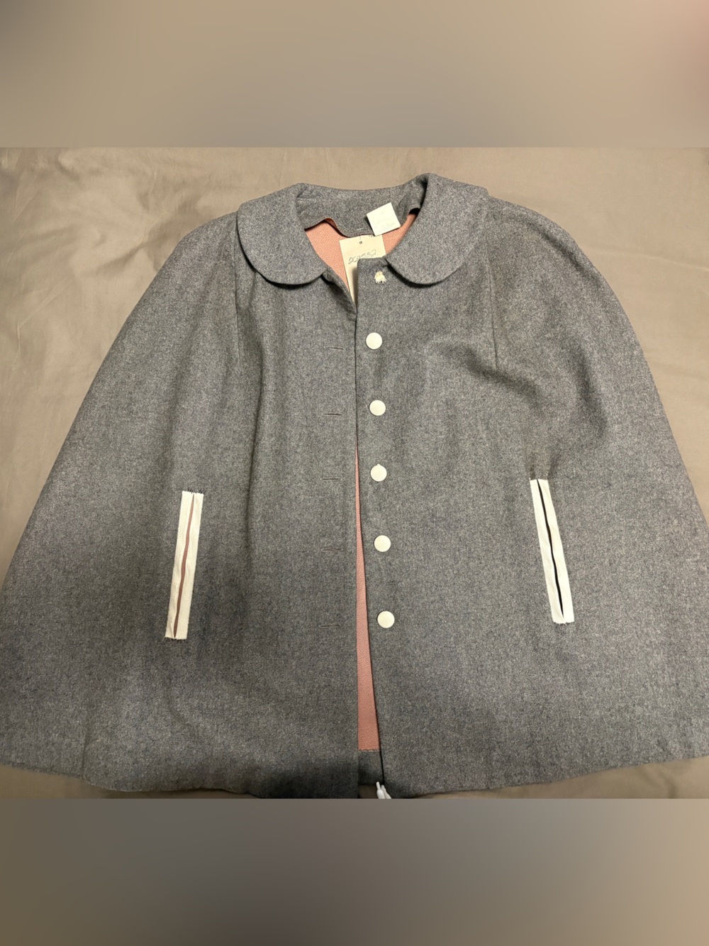 Grey Cape with Pink Lining and White Trim Accents